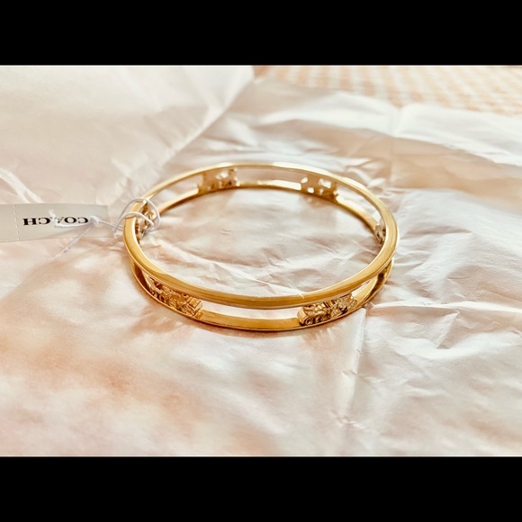 Coach Women's Horse and Carriage Bangle Bracelet Jewelry - Gold
